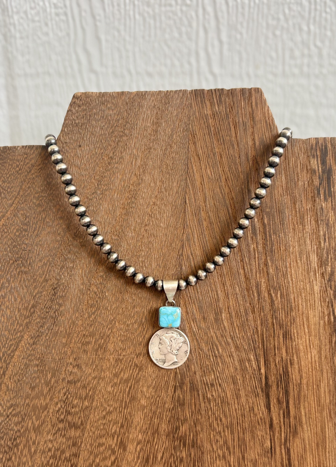 The Coin Pendants