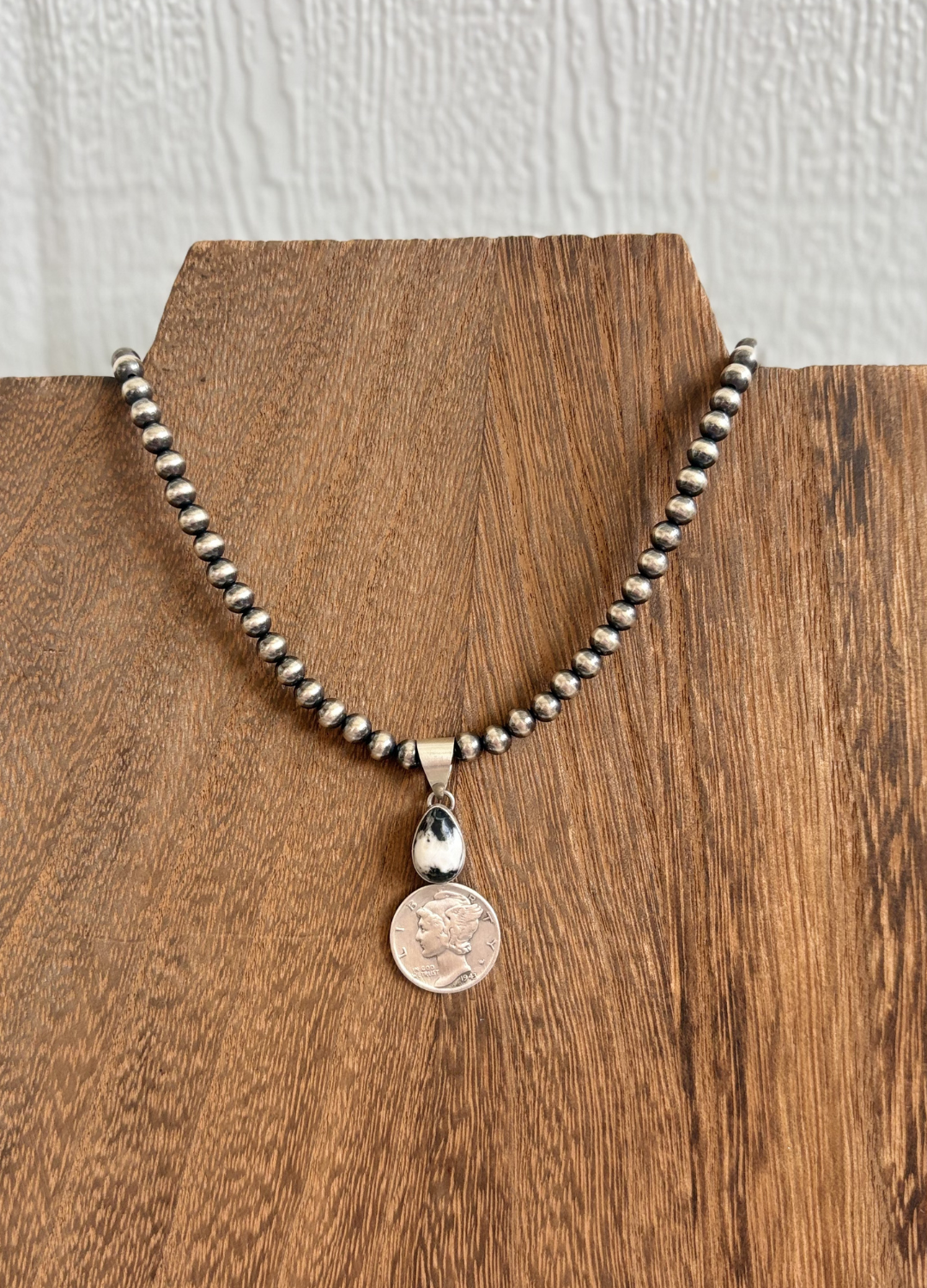 The Coin Pendants